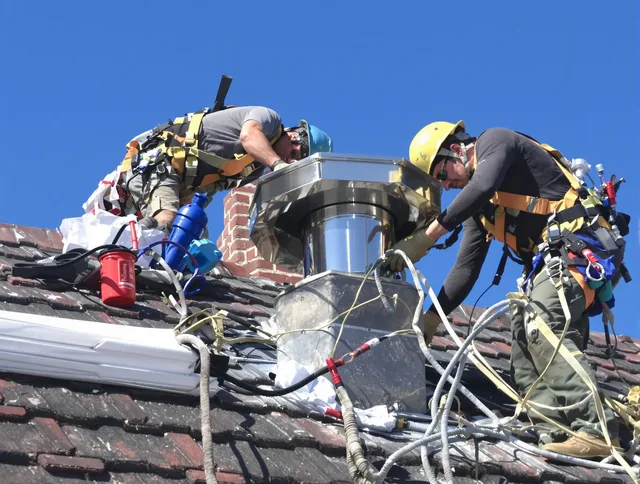Protective chimney cap installed by Berlin Chimney Sweep in Berlin, CT