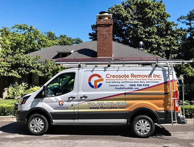Berlin Chimney Sweep technician removing creosote safely in Berlin, CT