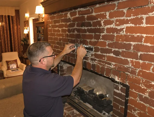 Berlin Chimney Sweep expert fixing a fireplace in Berlin, CT